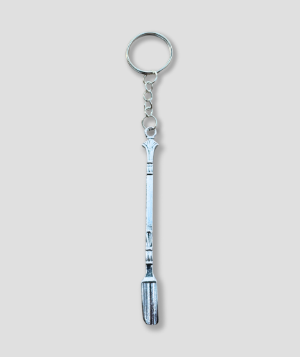 Llavero con forma de pala para tabaco.png