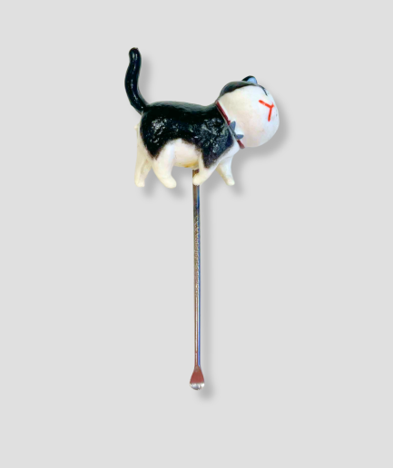 cuchara para raspar arena para gatos.png