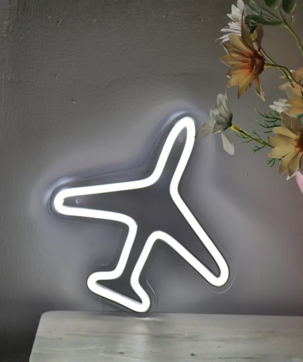 lámpara de neón con forma de avión