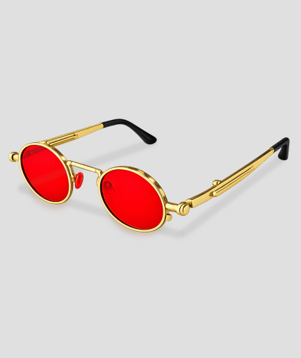 Gafas doradas con cristales rojos