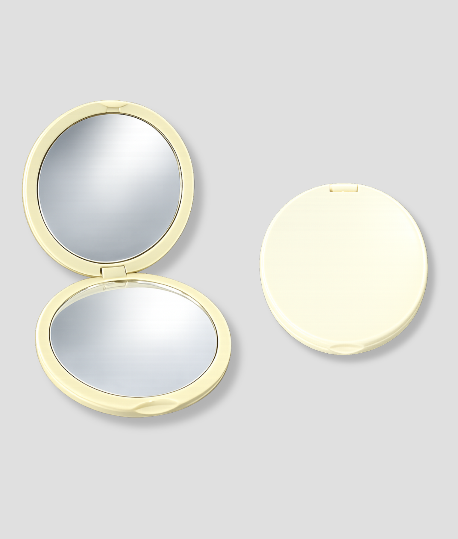 Gouden compacte make-up spiegel open en gesloten weergave op lichtgrijze achtergrond