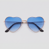 Blue heart, bril met goud montuur en blauw glazen